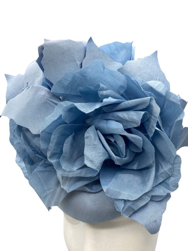 Stunning steel blue headpiece with matching handmade silk flowers.